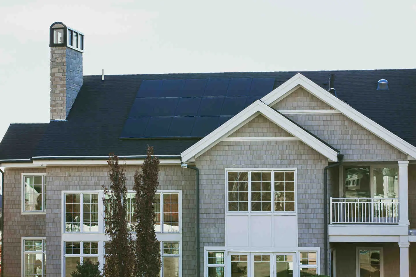 Residential solar panel installation on a shingle roof