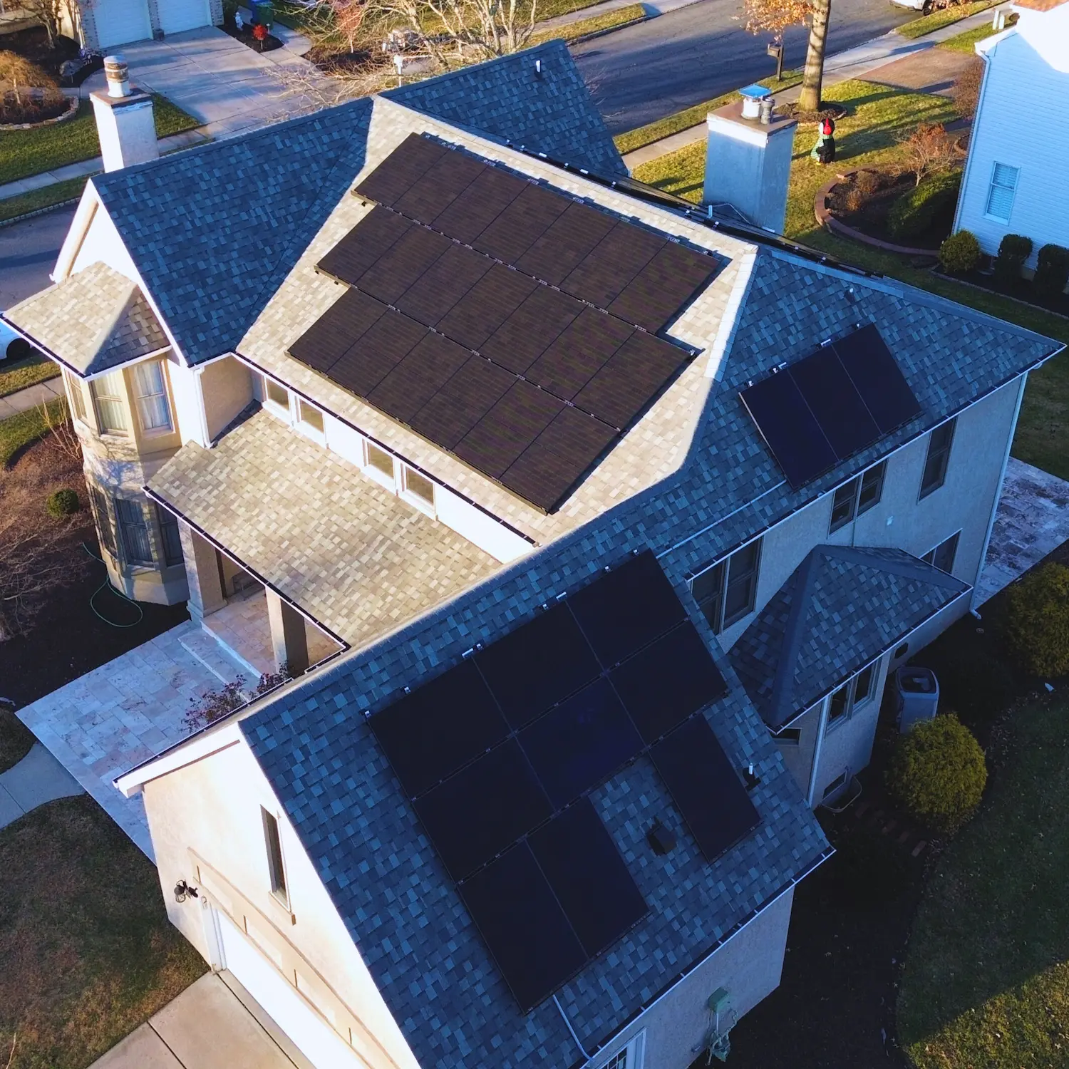 Home with rooftop solar and exterior work completed by Sundra