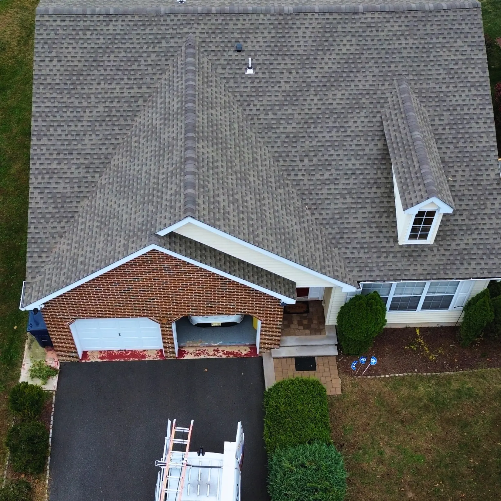 Completed shingle roof installation