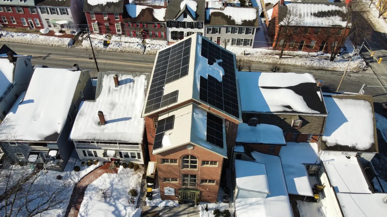 Solar panels on a main-street office building